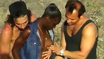 Two White Guys Pleasure A Black Woman On The Beach