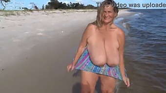 Mature Exhibitionist Flaunts Her Big Tits At The Beach